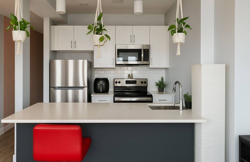 East New York Condo | Luxury 2-Story Penthouse in Brooklyn with Balcony and Private Deck