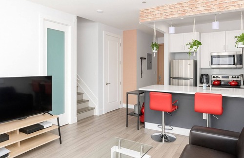 East New York Condo | Luxury 2-Story Penthouse in Brooklyn with Balcony and Private Deck