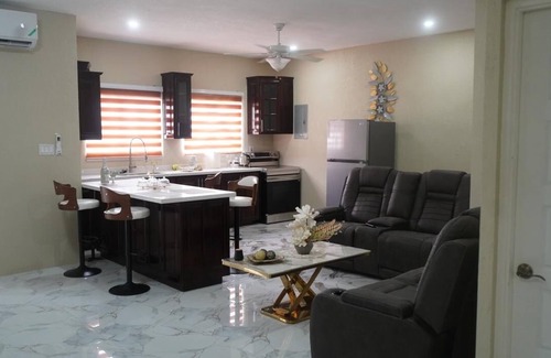 Saint Andrew Apartment | Luxury 3-bedroom apartment with pool overlooking the vibrant city of Kingston.