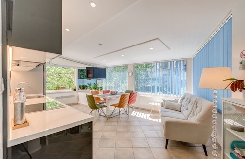 Split Apartment | Luxury apartment positioned in a green oasis in the middle of the city