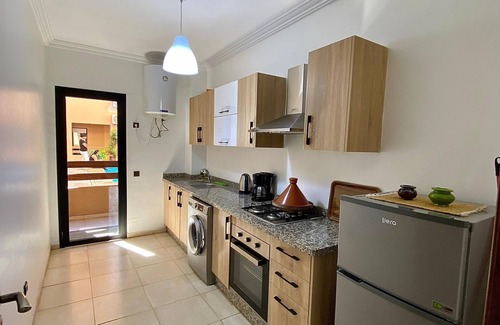 Hivernage Apartment | Luxury apartment with pool view next to the train station in Gueliz