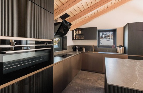 Graechen Ski Chalet | Luxury chalet with panorama, sauna, steam bath, hot tub & cinema, fondue house, and much more.