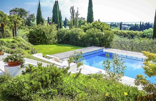 Montioni Villa | Luxury & Chic Rental Villa Lake Garda Lazise. Lake view and swimming pool