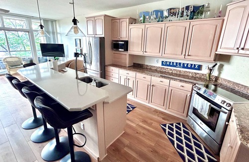 Charlevoix Apartment | Luxury Condo Downtown Charlevoix! Round LAKE VIEW! 2 WEEK MINIMUM REQUIRED
