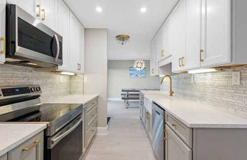 Crescent Beach Condo | Luxury Condo,-Steps to the Beach, Balcony, Ocean View + Pool