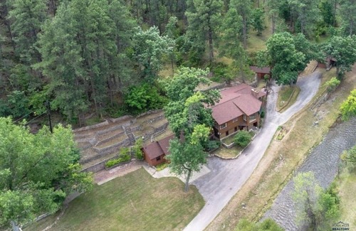 Colonial Pine Hills House | Luxury Creekside Icon
