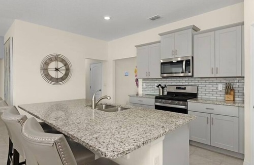 Sunridge Woods Villa | Luxury Family Villa with Themed Rooms, Pool, Spa & Games Room Near Disney
