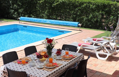 Almancil Villa | Luxury Family Villa with private heated pool, putting-green and tennis court