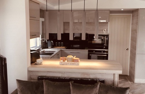 Swarland Ski Chalet | Luxury Holiday Home with Free Golf