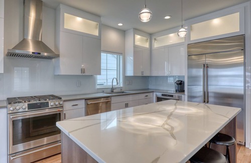 Pewaukee House | Luxury Lakefront Home w Miles of Lake Views, private pier, lake toys & game room