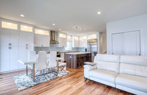 Pewaukee House | Luxury Lakefront Home w Miles of Lake Views, private pier, lake toys & game room