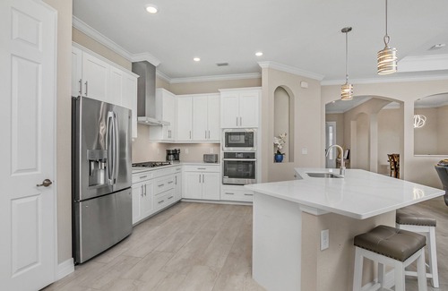 Biggar House | Luxury Lakefront 4-Bedroom Home with Private Pool and Resort Amenities in Estero