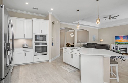 Biggar House | Luxury Lakefront 4-Bedroom Home with Private Pool and Resort Amenities in Estero