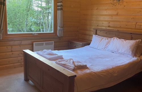 Kenwick Cabin | Luxury log Cabin With hot tub Overlooking the Kenwick Park Golf Course