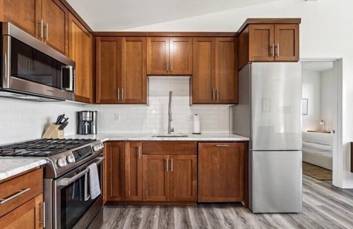 Buckman Neighborhood Apartment | Luxury Penthouse with Stunning Views & Fireplace