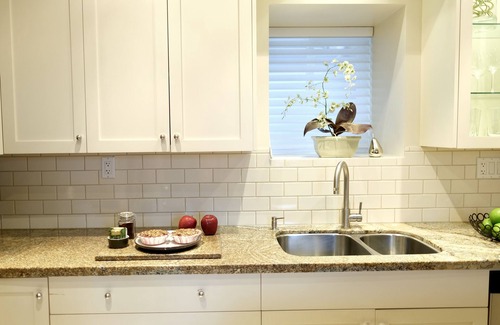 Riley Park Apartment | Luxury Romantic Designer Suite on Trendy Main Street