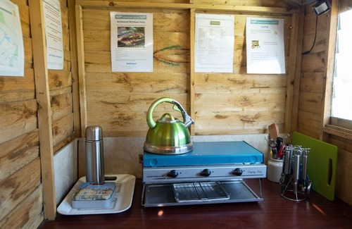 Huntingdon House | Luxury shepherd's hut - sleeps 2 adults 2 children. Access to hot tub & sauna.