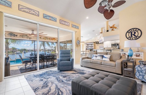 Burnt Store Isles House | Luxury Tropical long waterfront view w/bikes,kayaks,golf clubs,beach gear incl.