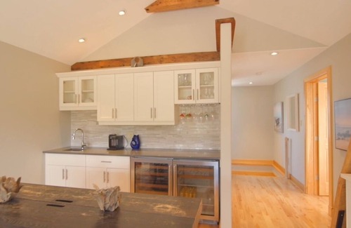Clinton House | Luxury Water View Home With 2 Living Spaces, Hot Tub & Access To River