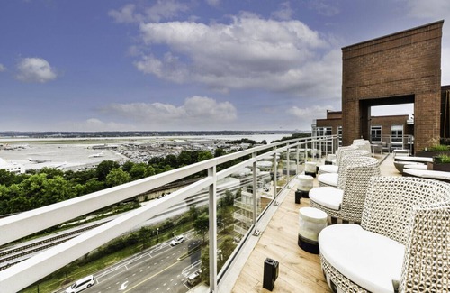 Crystal City Apartment | Luxxe 2BR Oasis with Scenic Rooftop & Gym ﻿
