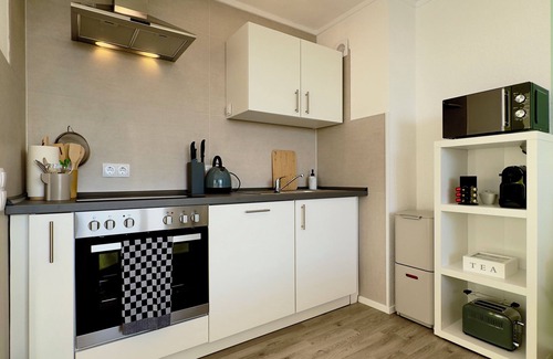 Kaiserslautern Apartment | M&D apartments near the stadium with balcony - Netflix - Kitchen - Sunset View