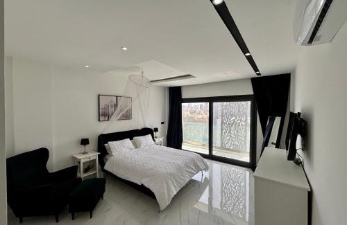Ngor Apartment | Magnifique Appartement avec PISCINE sur le toit, 3 Chambres, 4 Salles de Bain, Salle de Gym et Terrasse, LUXURY & COMFORT in ALMADIES