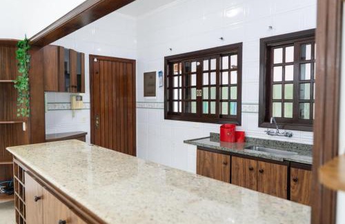 Jardim Virginia House | MAISON PARTY GUARUJÁ, PRAIA PISCINA SINUCA CHURRASQUEIRA HIDROMASSAGEM