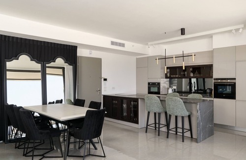 Kerem HaTeimanim Apartment | MAMAD Luxury 2BR with Terrace & Sea View by FeelHome