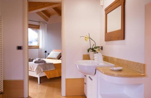 Baselga di Pine Apartment | Mansarda con terrazzo e giardino Altopiano di Piné