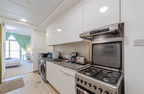 Jumeirah Village Circle Apartment | Marco Polo - Studio in JVC Amidst Parks + Gym & Pool