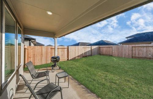 Barker House | Marice Escape at Fulshear with Community pool