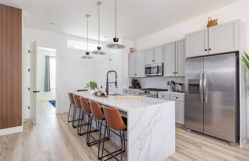 East Bank House | Massive Luxury Home w/Rooftop, Hot-tub, Game room, Mini Golf, Views, and more