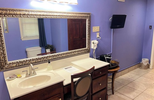 Whitehaven House | Maxie's retreat: Enjoy this charming house w/modern updates & timeless appeal.