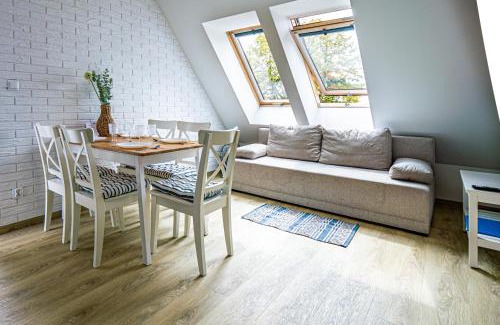 Ogonki Apartment | Mazurskie Apartamenty "Jak Tu Miło!"
