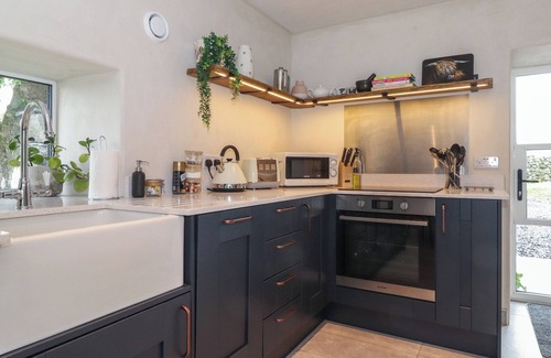 Penrith House | MEADOW SYKE BYRE, pet friendly, with hot tub in Bampton, Cumbria