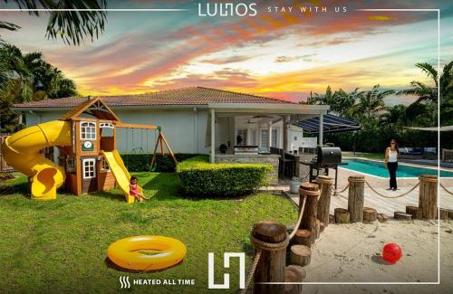 Ludlam House | Miami 5BR Villa w Heated Pool, Games & BBQ L01