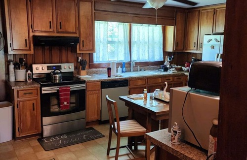 Hubert House | Mid-Century Country Home, nice front porch and east west split bedroom suites.