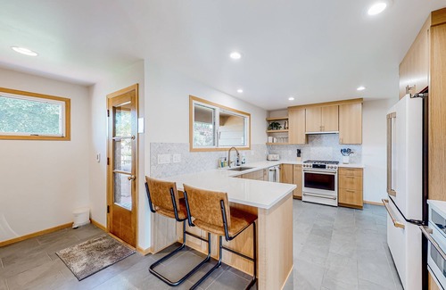 Spokane House | Mid-century home with hot tub & firepit - near the river & golf course