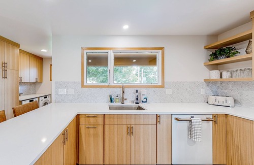 Spokane House | Mid-century home with hot tub & firepit - near the river & golf course
