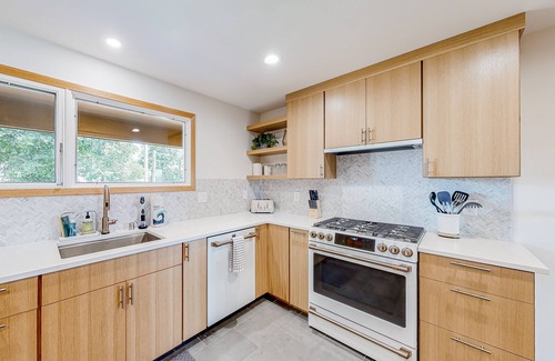 Spokane House | Mid-century home with hot tub & firepit - near the river & golf course