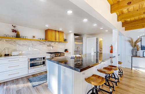 Running Springs House | Mid-century modern home nestled in the forest with mtn views & large balcony