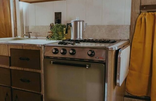 Wichita House | Mid-Century Ranch: Hot Tub & Vintage Camper