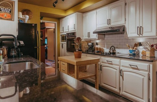 Wichita House | Mid-Century Ranch: Hot Tub & Vintage Camper