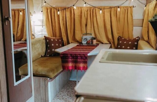 Wichita House | Mid-Century Ranch: Hot Tub & Vintage Camper