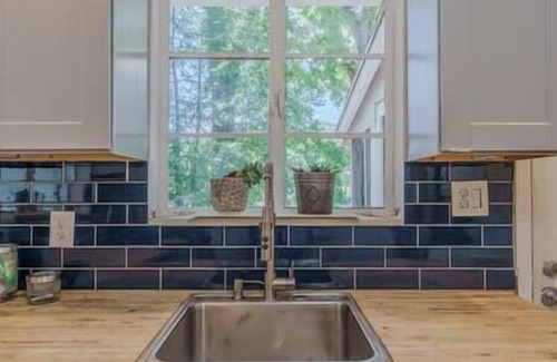 East Point House | Mid-Century Ranch near Airport