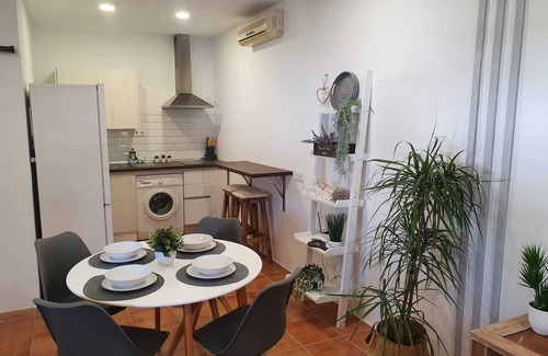 Chiclana de la Frontera House | Minichalet Jacaranda with swimming pool, garden and barbecue.
