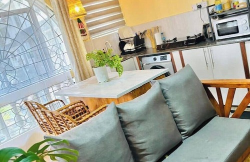 Mikocheni Apartment | Minzi Homes | Cozy Green Escape with balcony views