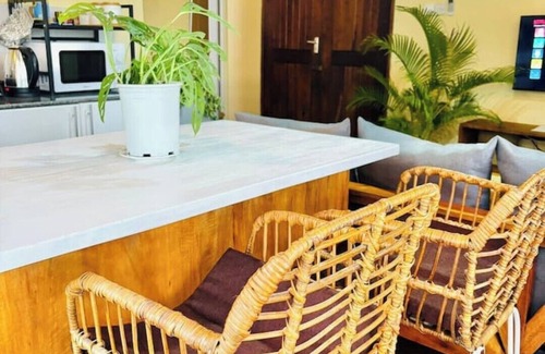 Mikocheni Apartment | Minzi Homes | Cozy Green Escape with balcony views