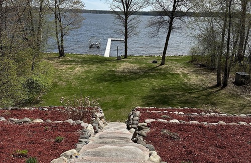 Ossipee House | Mission Lake home with dock and sandy bottom