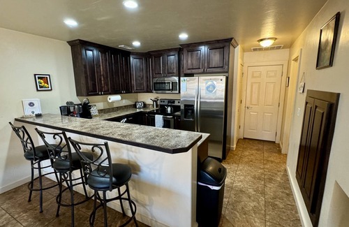 Moab South Valley House | Moab Rim Views! I Pet Friendly I Garage I Pool & Hot Tub